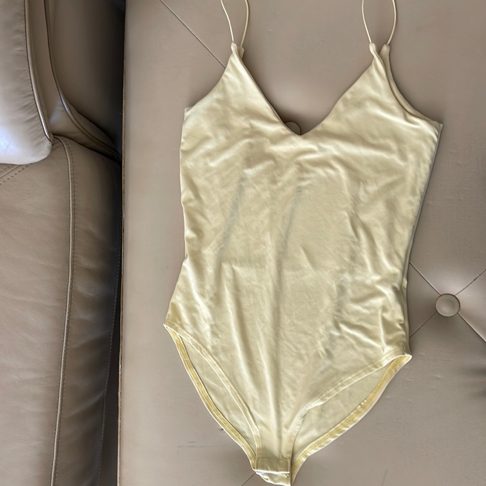Yellow body suit